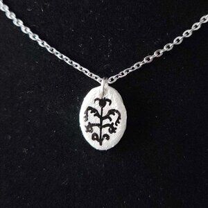 Iridescent Victorian Goth necklace with a small silver chain